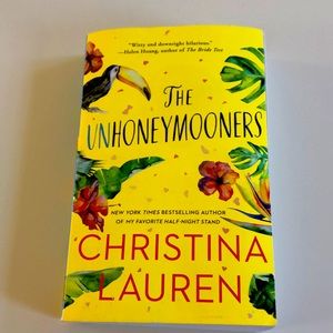 Gently used copy of The Unhoneymooners by Christina Lauren